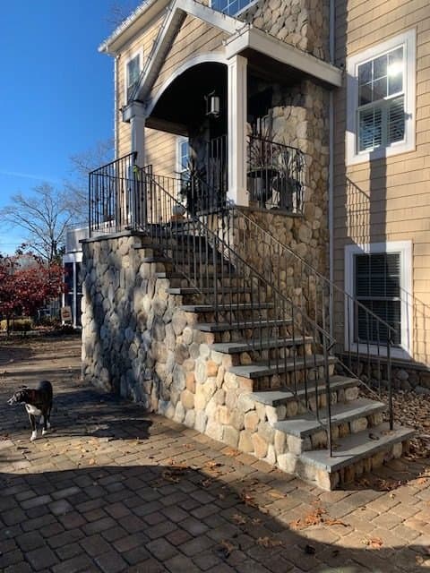 Fieldstone stairs with a railing